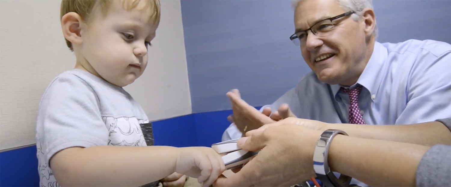 Dr. Campbell working with child patient