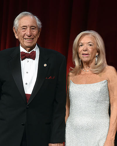 Robert E. Fischell, ScD and Susan R. Fischell announcing gift Saturday evening at the UMSOM Gala