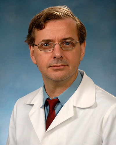 Adam C. Puche, PhD