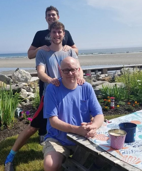 Dr. Cowan at the beach with his sons