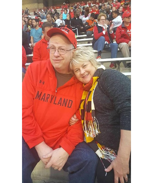 Dr. Cowan at Terps game with his wife