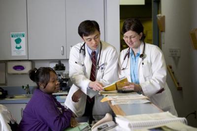 Twp physicians reviewing a medical chart