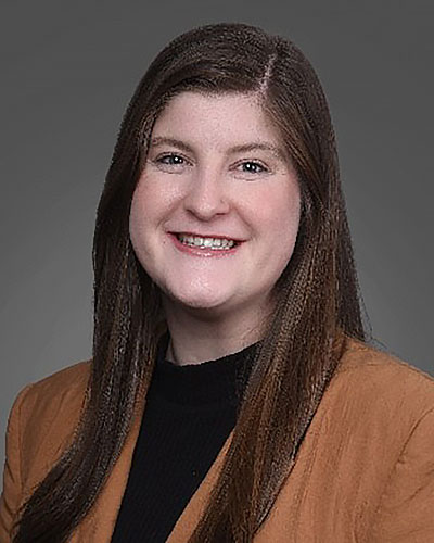 Image of woman dressed professionally