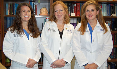 Group photo of Drs. Jones, Hollander and Kahntroff