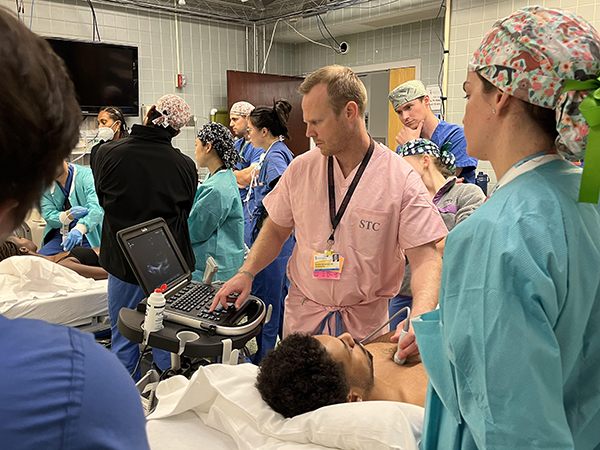Room full of doctors and patients