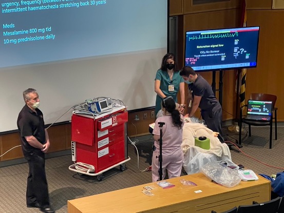 Residents demonstrating a code blue at weekly conference