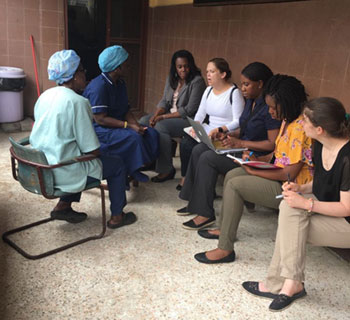 Deborah Olumuyiwa speaking with group at St. Joseph's Catholic Hospital