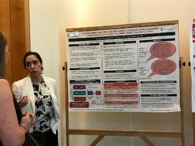 Dr. Diana Carvajal discusses her poster at Primary Care Day.