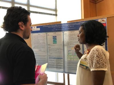 Dr. Weyinshet Gossa presents her poster at Primary Care Day.