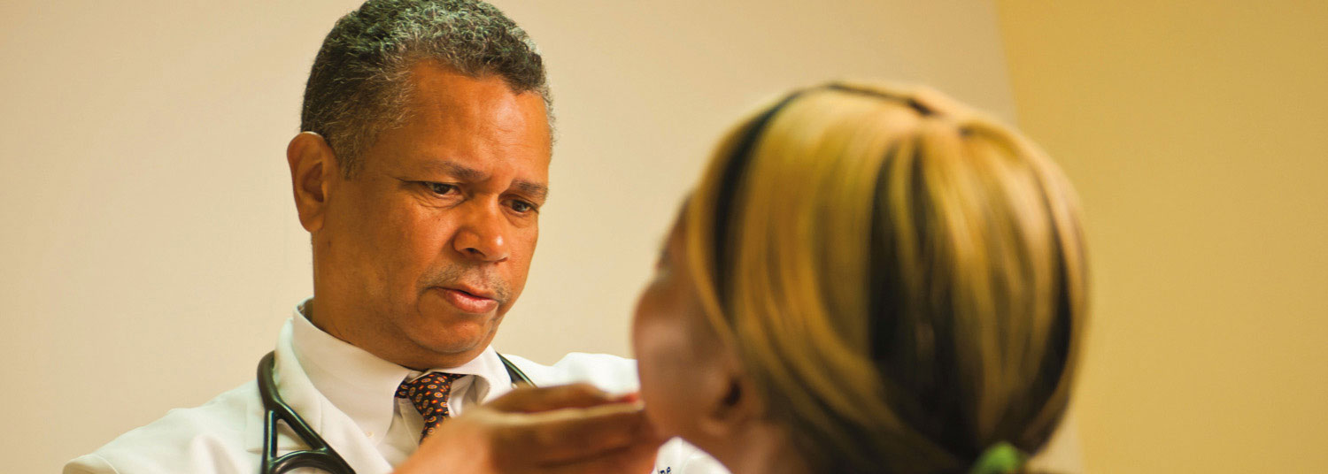 Dr. Davis caring for a patient