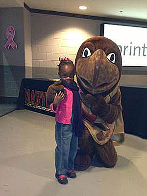 University of Maryland Mascot, Testudo, with child