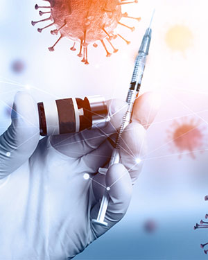 Hand with glove holding a needle