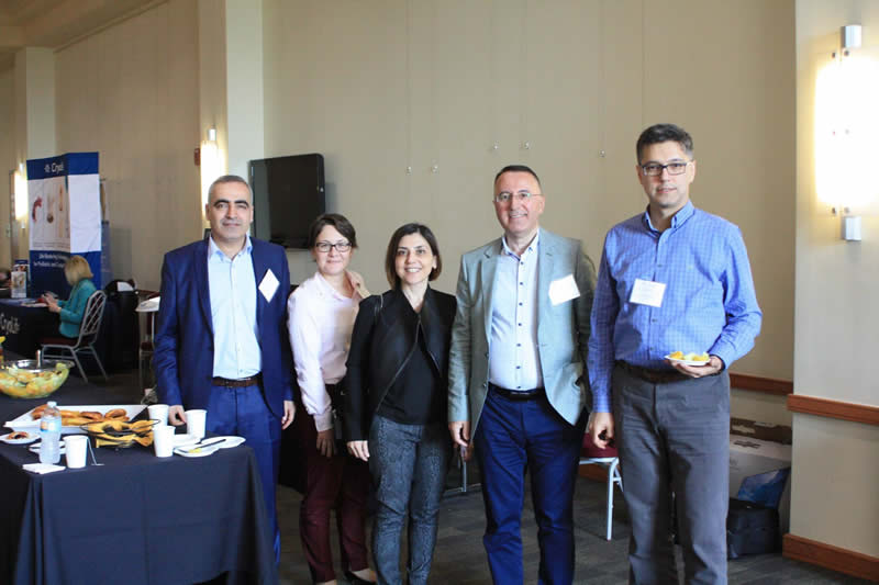 Group photo of guests at symposium