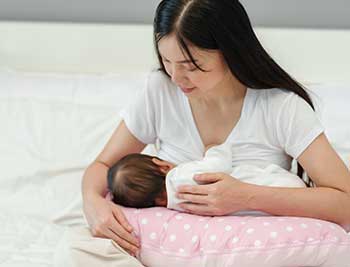 Asian Mom Breastfeeding