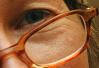 Close up of woman in glasses