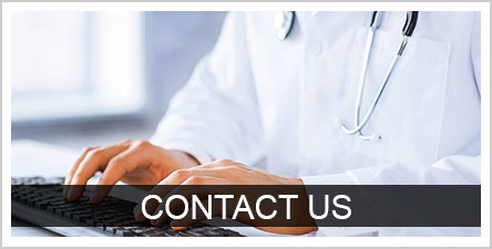 Contact Us text with a doctor typing on a computer in the background