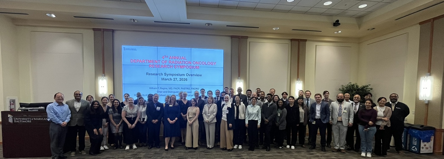 Research Symposium Banner 2026 group photo with all faculty and staff