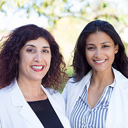 Two female doctors smiling