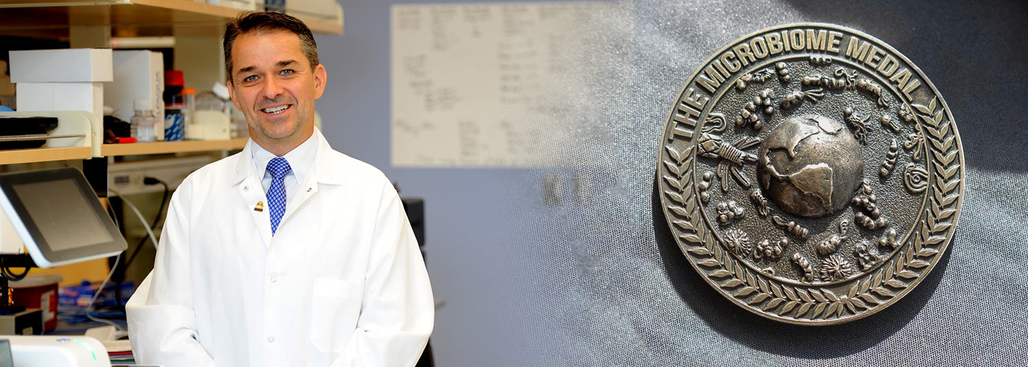 Jacques Ravel, Phd pictured with his Microbiome Medal Laureate