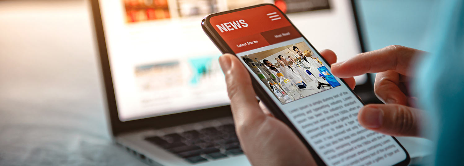 Hand holding cell phone