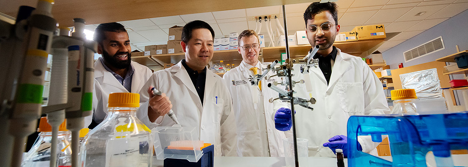 Team of researchers in lab