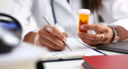 Doctor prescribing medication
