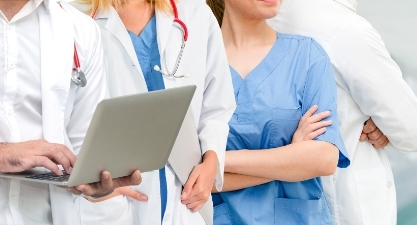 Healthcare professionals with their arms crossed