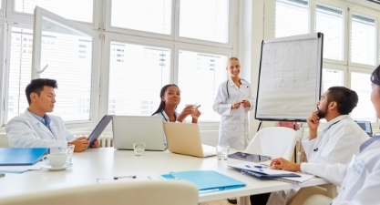 Healthcare providers sitting around a table