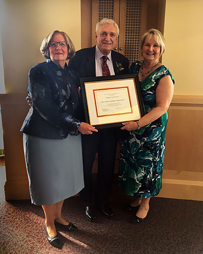 Dr. Blaustein's wife, Ellen Blaustein, with Dr. Blaustein and M.J. Tooey, the executive director of the HSHSL