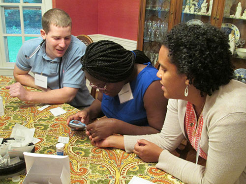 University of Maryland School of Medicine medical students Daniel Summers and Mahoussi Aholoukpe at a recent PCT Workshop.