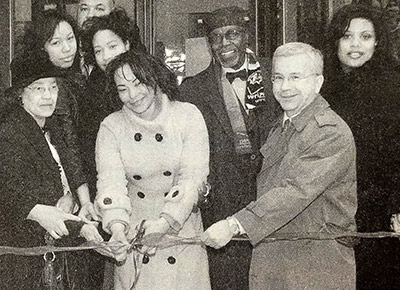 Dr. Lehman at Ribbon Cutting for the Carter Center's reopening in 2010, From Left to Right: Mayor Stephanie Rawlings-Blake, Senator Jill Carter (daughter of Walter P. Carter), and other elected officials and event attendees.