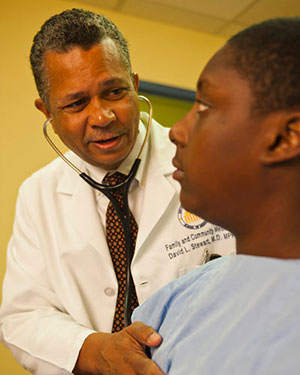 Dr. David Stewart with a Patient