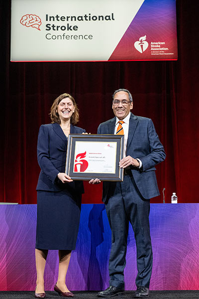 Dr. Chaturvedi receiving the award