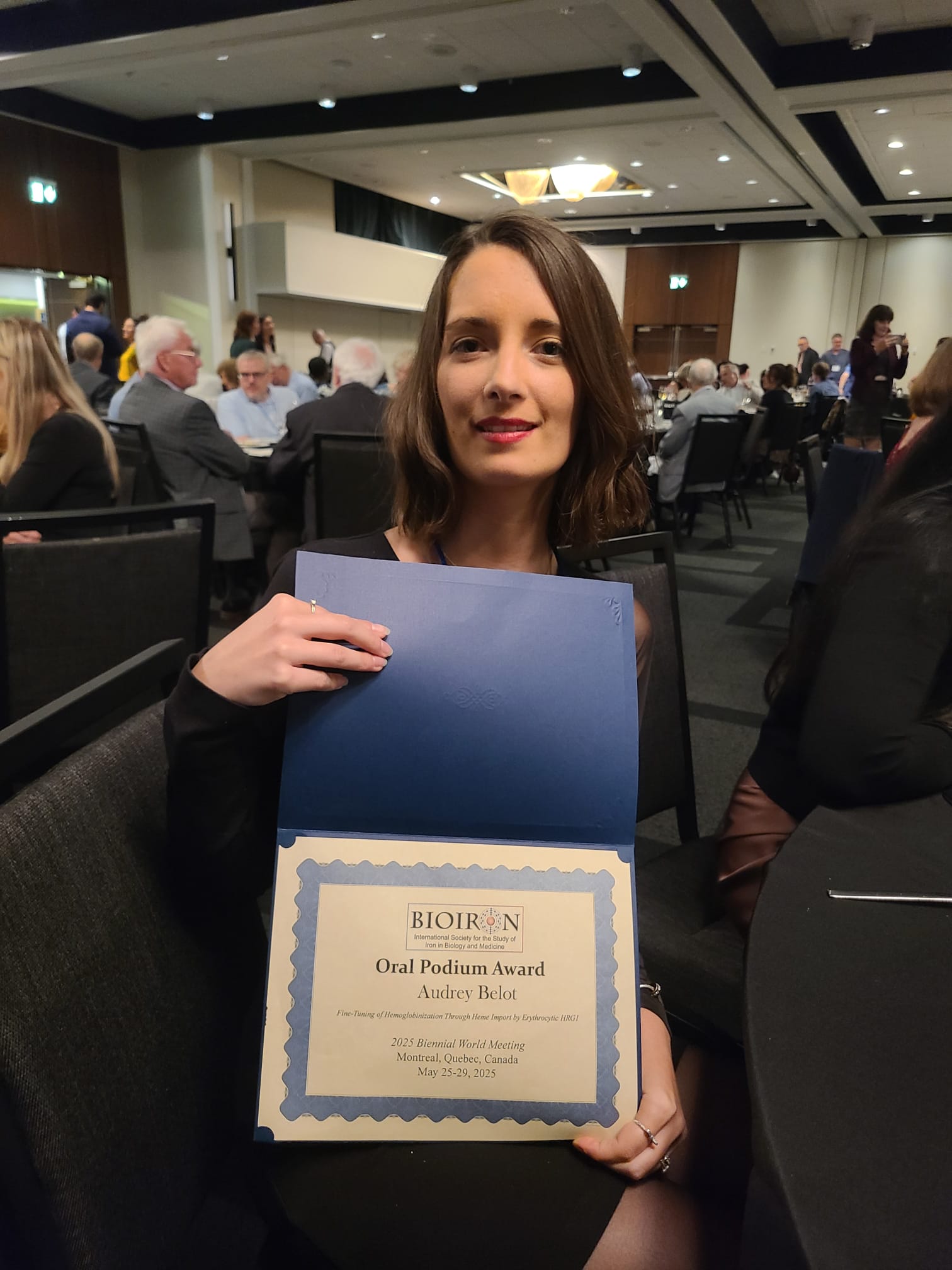 Picture of Postdoc with award