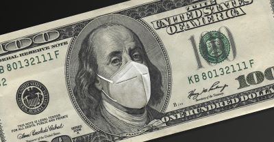 A 100 dollar bill with a mask over Benjamin Franklin's face