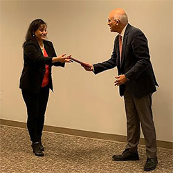 Dr. Chang receiving award