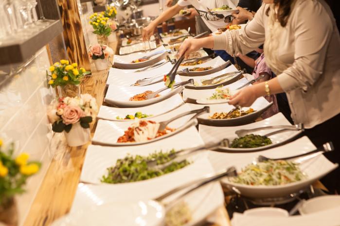 Food available buffett style on a table