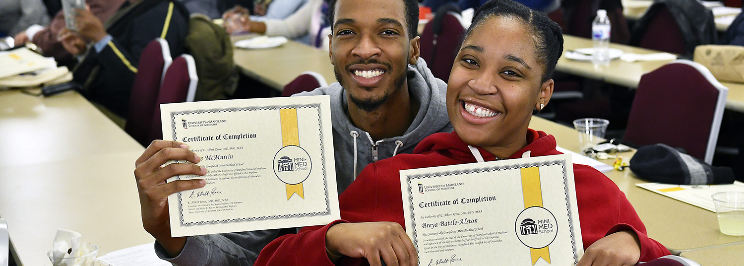 Photo of recent Mini-Med School graduates